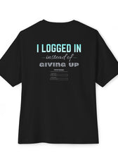 Back of black gaming mental health awareness shirt featuring “I Logged In Instead of Giving Up” graphic from Mouse & Key